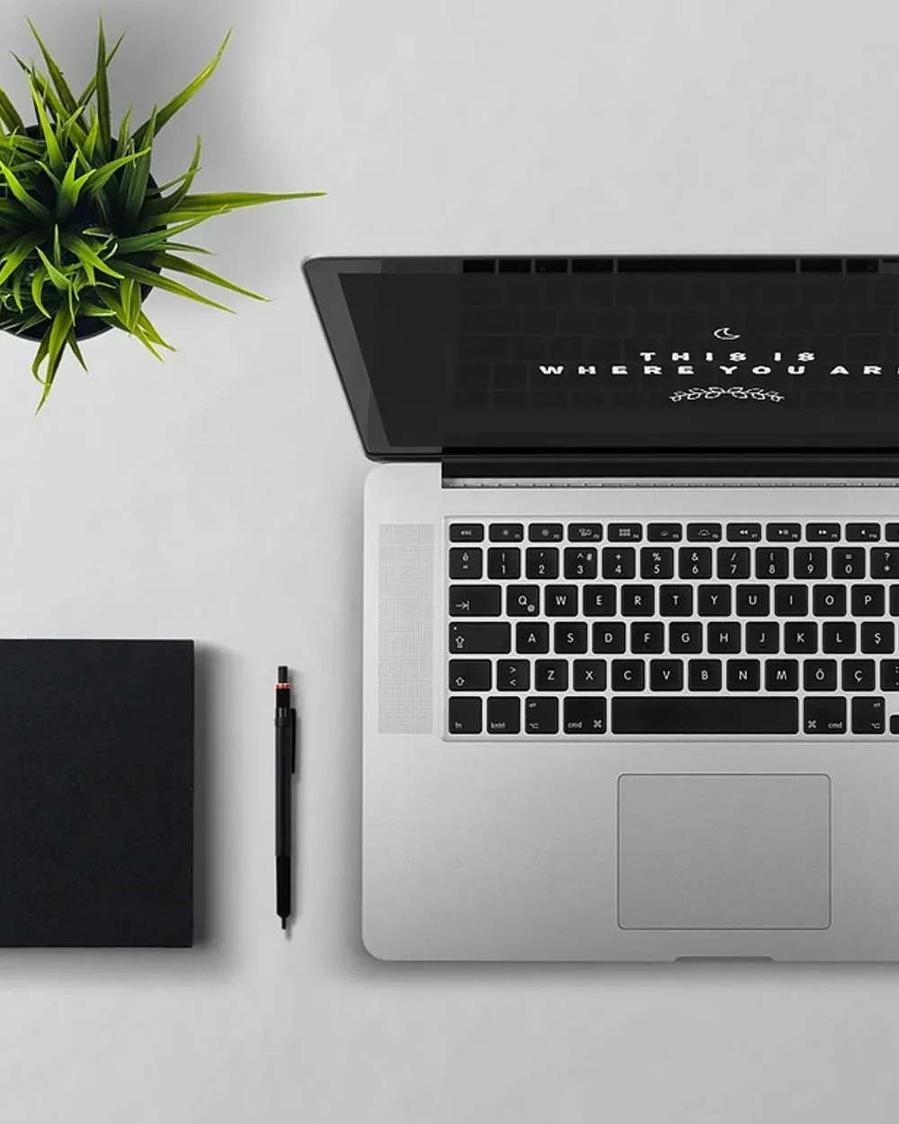 Laptop showing an online product listing on a tidy desk